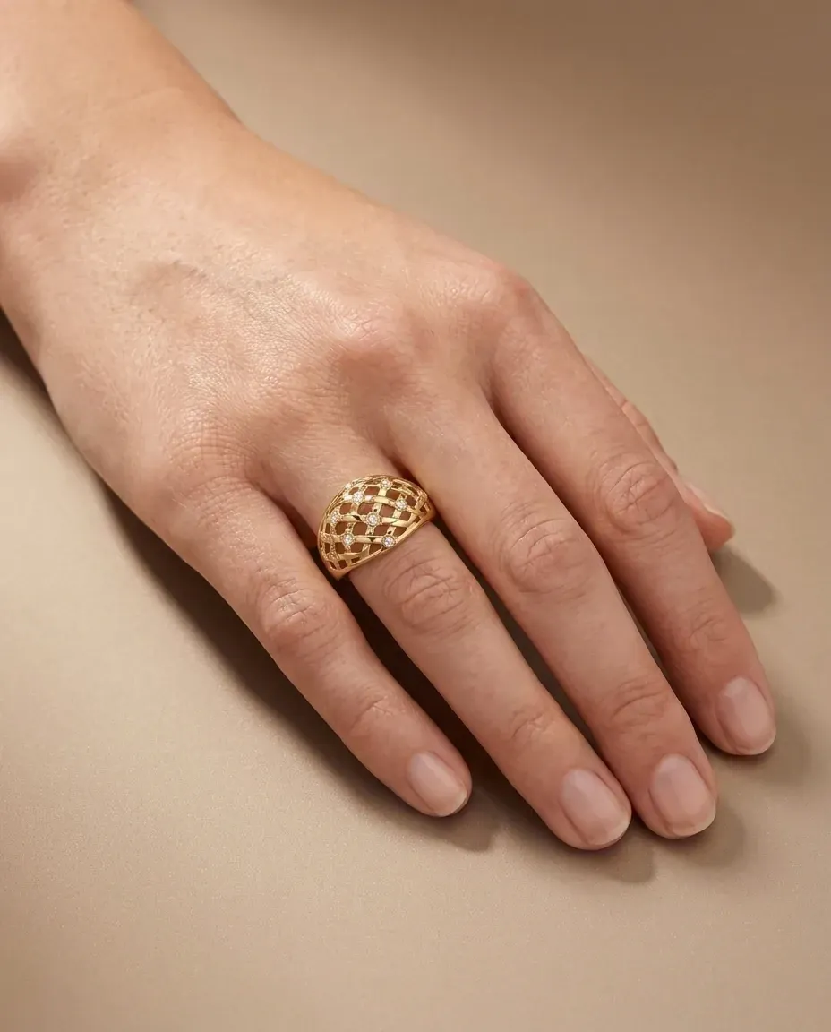 Design visualisation of the Gol-e Shab Diamond Lattice Ring worn on the hand: a pierced gold lattice dome set with small diamonds.