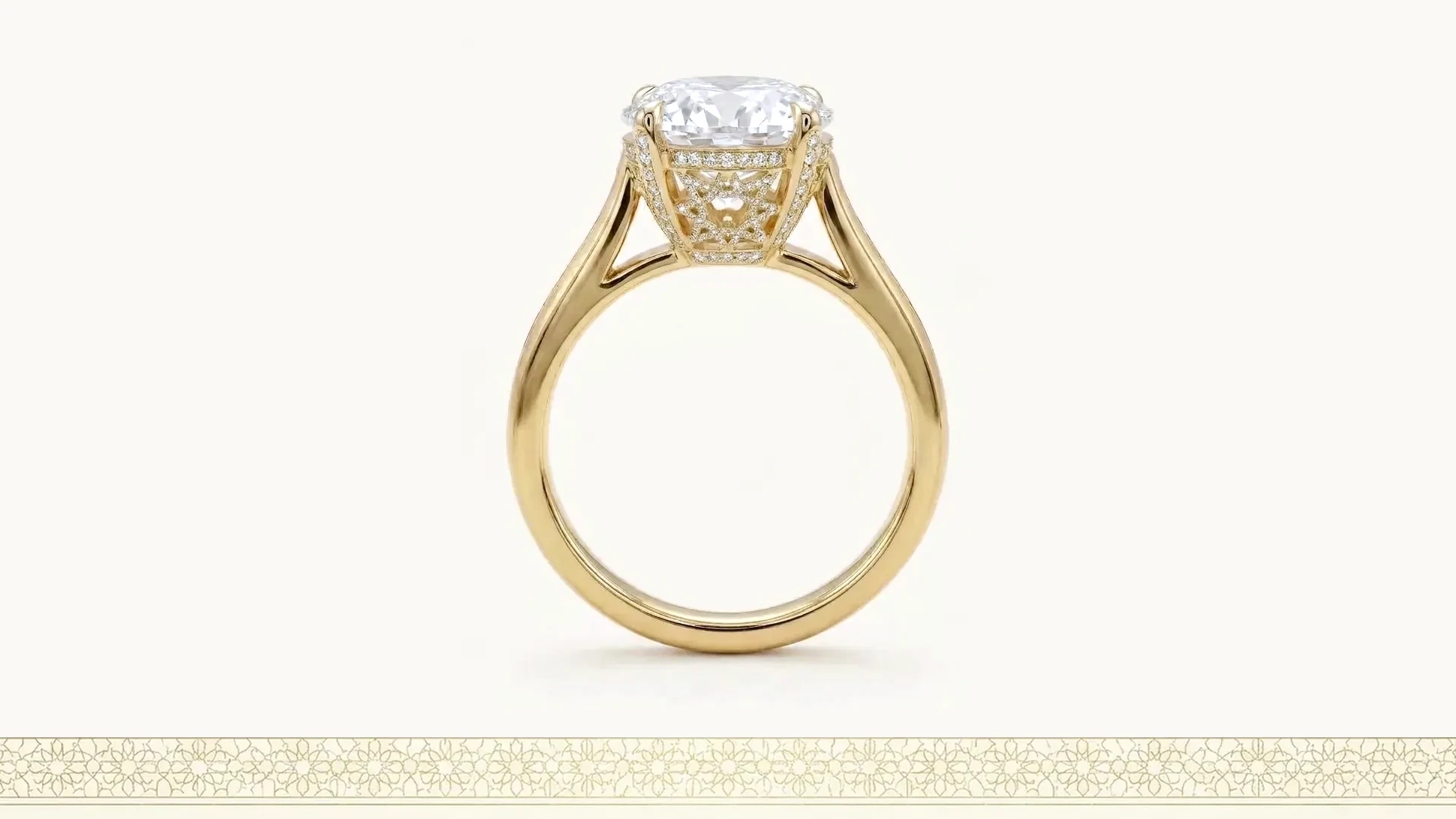 A gold solitaire ring seen in profile, photographed on a plain ground